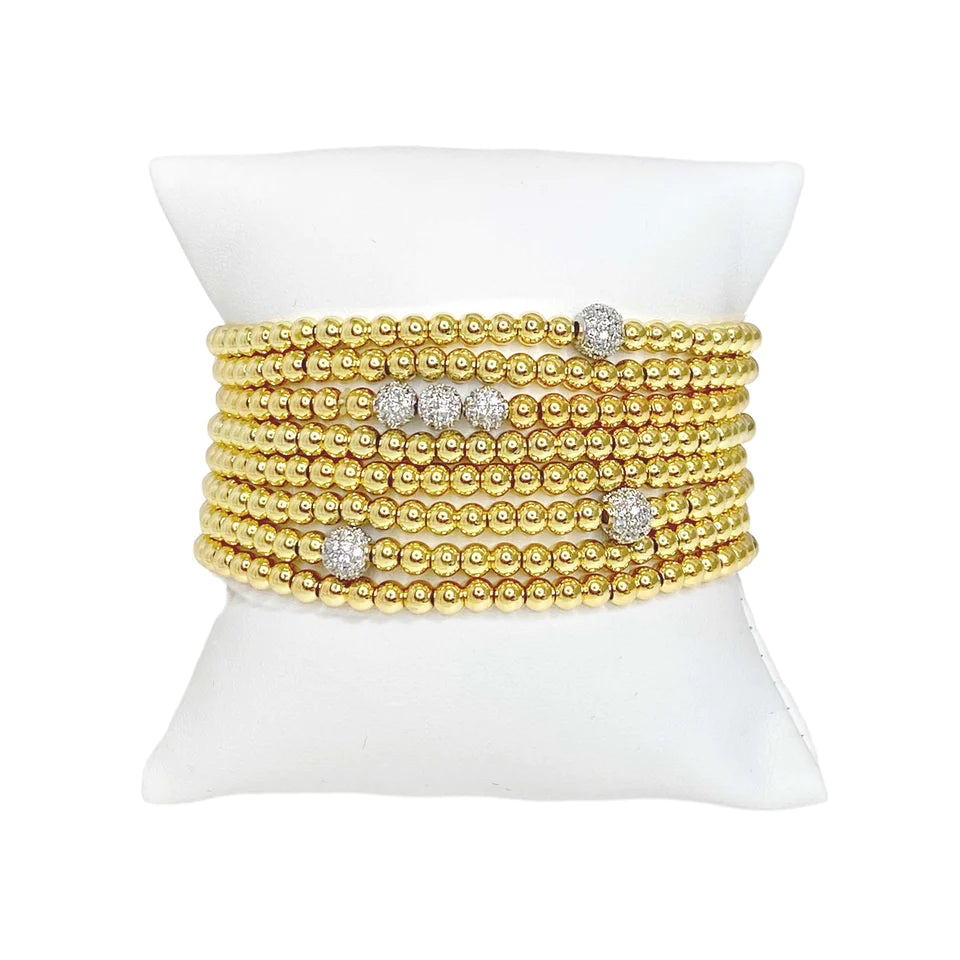 Golden Stack Of Beaded Bracelets